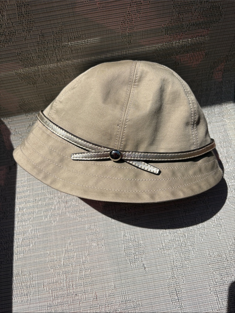 Coach bucket HAT featuring a brown leather "Coach est. 1941" interior patch